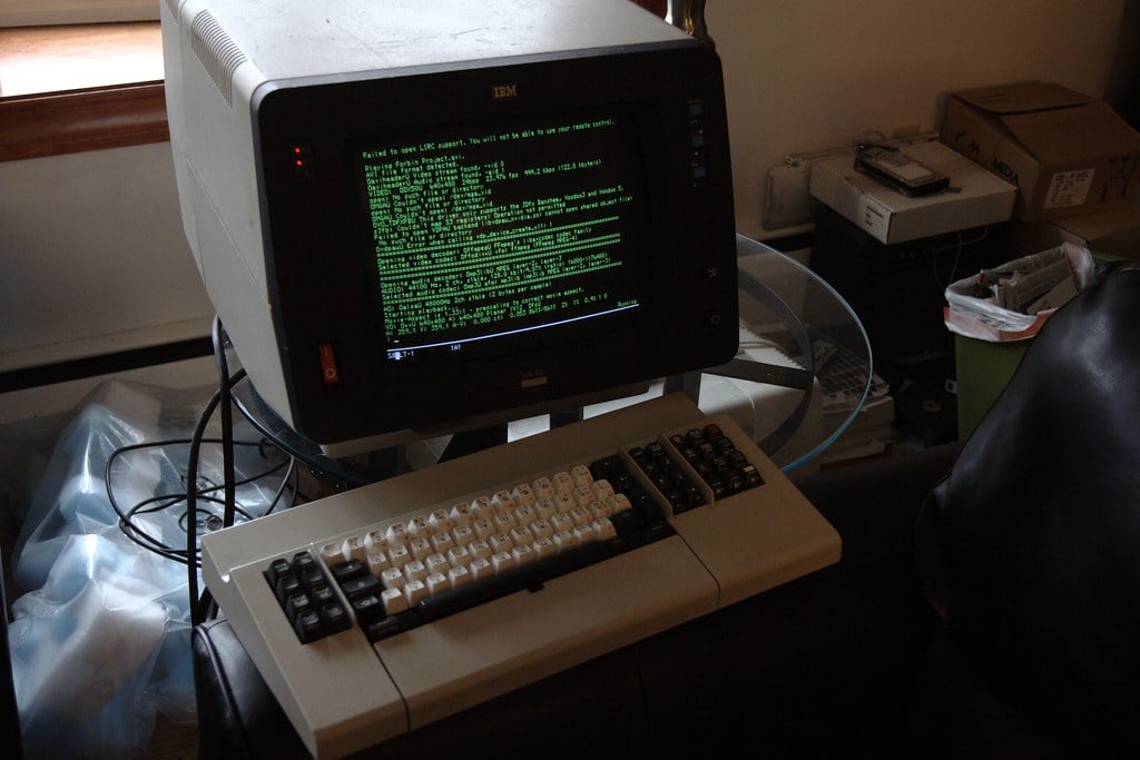 This was a huge improvement over coding pads and punch cards. "IBM 3279-S3G" by vaxomatic is licensed under CC BY 2.0.